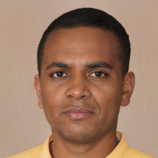 Neutral black young-adult male with short  black hair and brown eyes