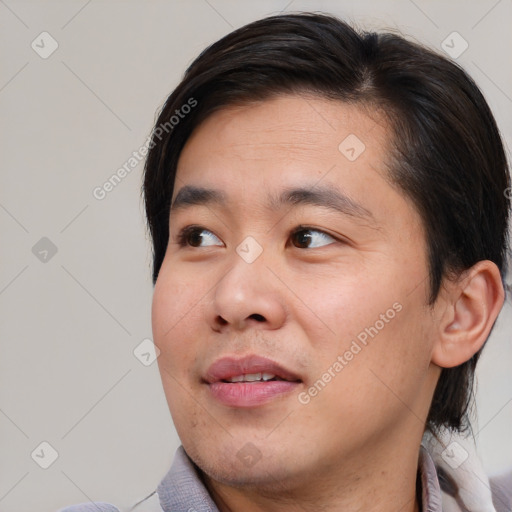 Neutral asian young-adult male with short  brown hair and brown eyes