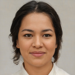 Joyful asian young-adult female with medium  brown hair and brown eyes