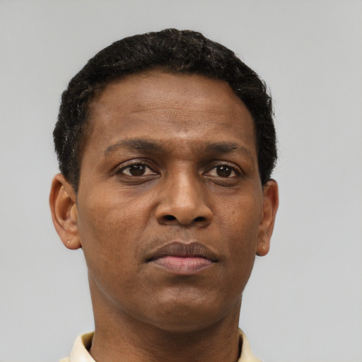 Neutral black young-adult male with short  brown hair and brown eyes