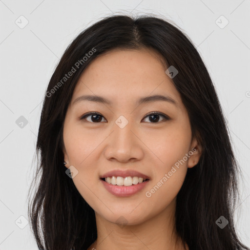 Joyful asian young-adult female with long  brown hair and brown eyes