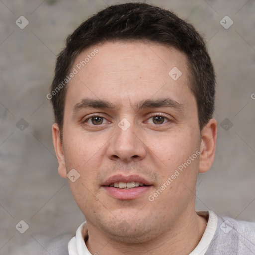 Joyful white adult male with short  brown hair and brown eyes