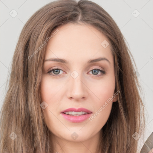 Joyful white young-adult female with long  brown hair and grey eyes