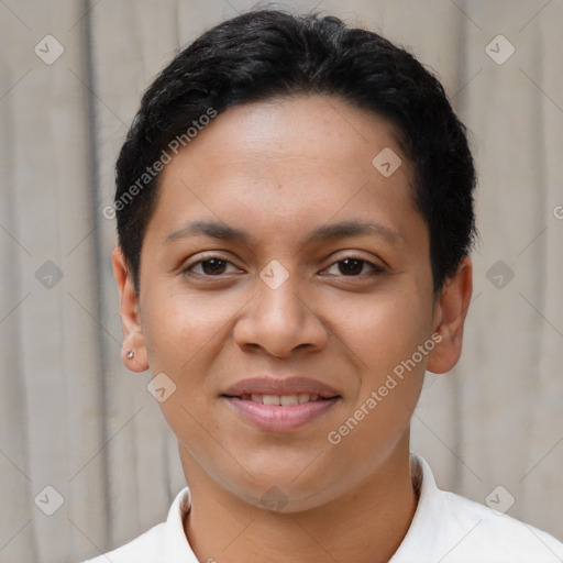 Joyful latino young-adult female with short  brown hair and brown eyes