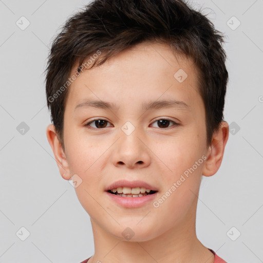 Joyful white child male with short  brown hair and brown eyes