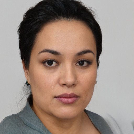 Neutral asian young-adult female with medium  black hair and brown eyes