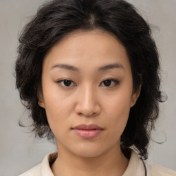 Neutral asian young-adult female with medium  brown hair and brown eyes