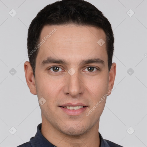 Joyful white young-adult male with short  brown hair and brown eyes