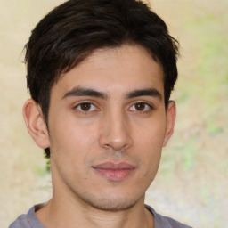 Neutral white young-adult male with short  black hair and brown eyes