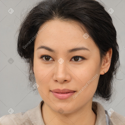 Joyful latino young-adult female with medium  brown hair and brown eyes