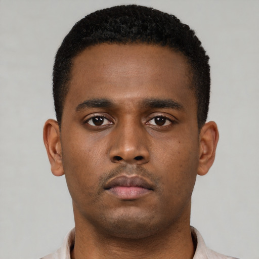 Neutral black young-adult male with short  brown hair and brown eyes