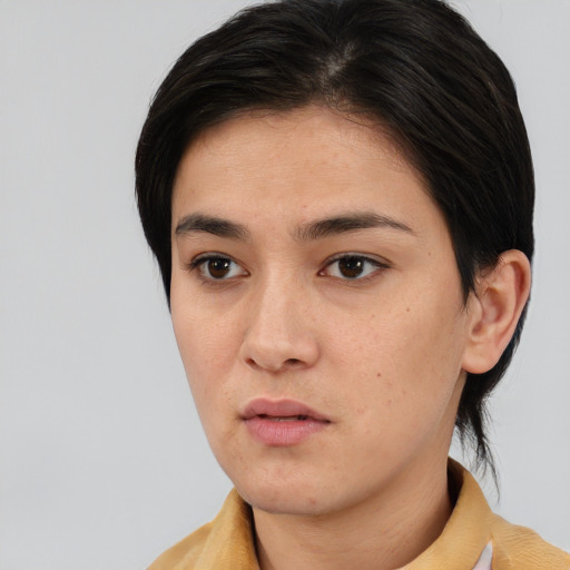 Neutral asian young-adult female with medium  brown hair and brown eyes