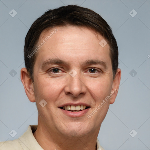 Joyful white adult male with short  brown hair and brown eyes