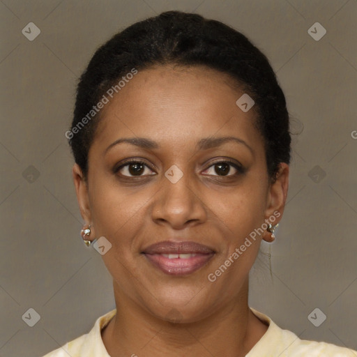 Joyful black young-adult female with short  brown hair and brown eyes