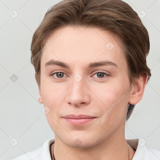 Joyful white young-adult female with short  brown hair and grey eyes