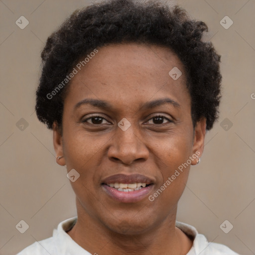 Joyful black adult female with short  brown hair and brown eyes