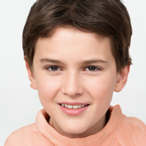 Joyful white child male with short  brown hair and brown eyes