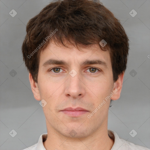 Neutral white young-adult male with short  brown hair and brown eyes