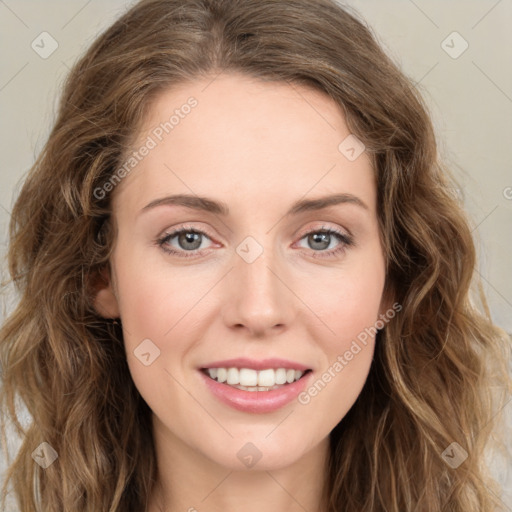 Joyful white young-adult female with long  brown hair and green eyes