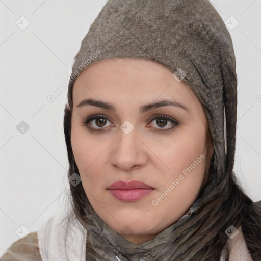 Joyful white young-adult female with medium  black hair and brown eyes