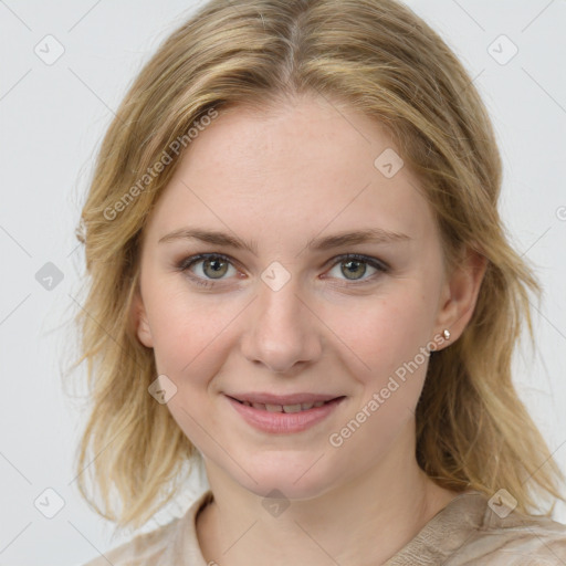 Joyful white young-adult female with medium  brown hair and blue eyes