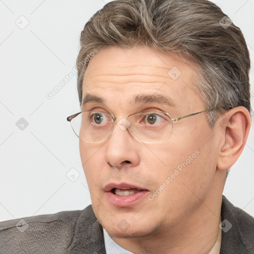 Neutral white middle-aged male with short  brown hair and brown eyes