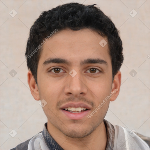 Joyful latino young-adult male with short  black hair and brown eyes