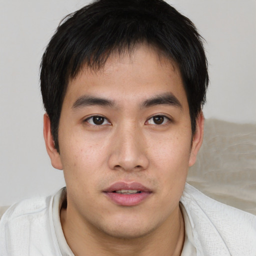Neutral asian young-adult male with short  brown hair and brown eyes