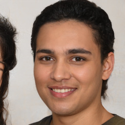 Joyful white young-adult male with medium  brown hair and brown eyes