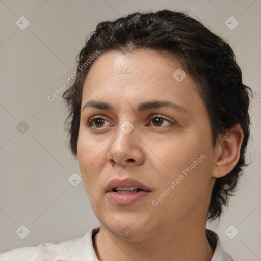 Joyful white adult female with medium  brown hair and brown eyes