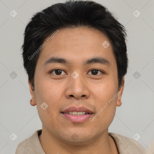 Joyful asian young-adult male with short  brown hair and brown eyes