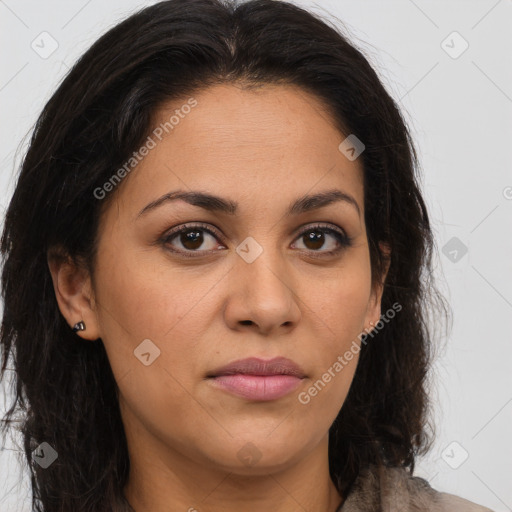 Joyful latino young-adult female with long  brown hair and brown eyes