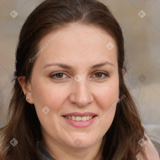 Joyful white adult female with long  brown hair and brown eyes