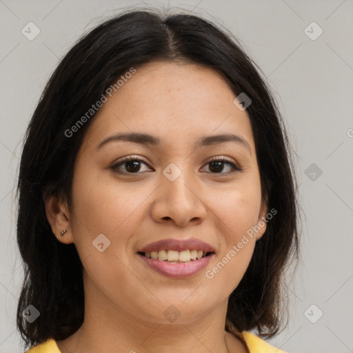 Joyful latino young-adult female with medium  brown hair and brown eyes