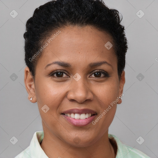 Joyful black young-adult female with short  brown hair and brown eyes