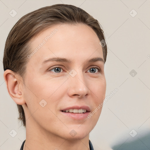 Joyful white young-adult female with short  brown hair and grey eyes