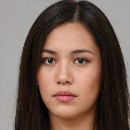 Neutral asian young-adult female with long  brown hair and brown eyes