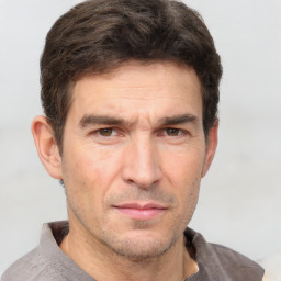 Neutral white adult male with short  brown hair and brown eyes