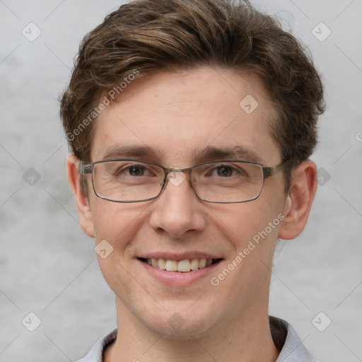 Joyful white adult male with short  brown hair and grey eyes