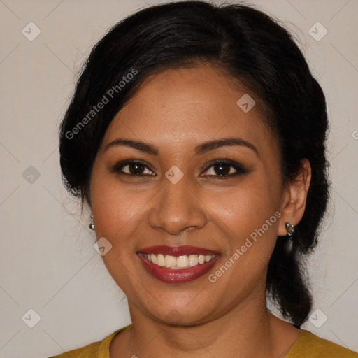 Joyful latino young-adult female with medium  brown hair and brown eyes