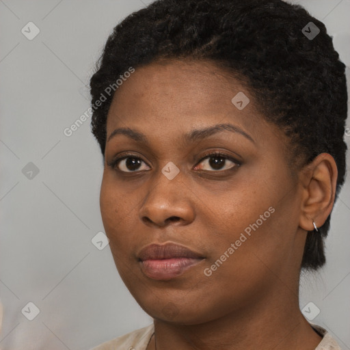 Neutral black young-adult female with short  brown hair and brown eyes