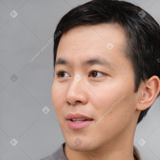 Neutral asian young-adult male with short  black hair and brown eyes