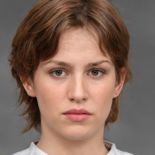 Neutral white young-adult female with medium  brown hair and grey eyes