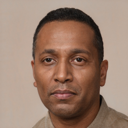 Neutral black adult male with short  black hair and brown eyes