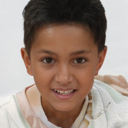 Joyful white child male with short  brown hair and brown eyes