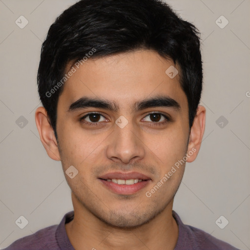 Joyful white young-adult male with short  black hair and brown eyes