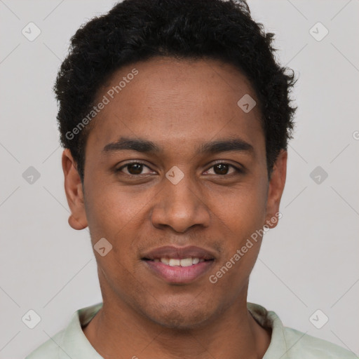 Joyful black young-adult male with short  brown hair and brown eyes