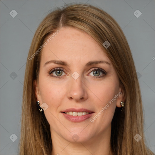 Joyful white adult female with long  brown hair and brown eyes