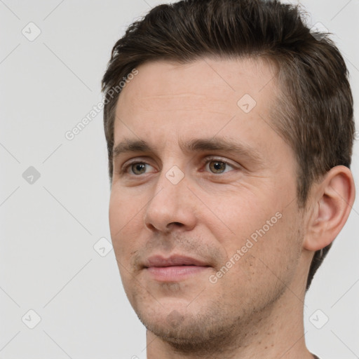 Neutral white adult male with short  brown hair and brown eyes