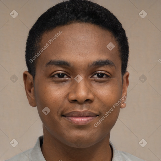 Joyful black young-adult male with short  brown hair and brown eyes